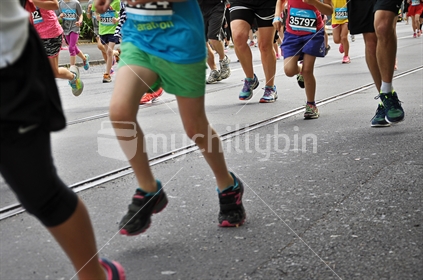 Runners in the Auckland Kids Marathon (selective focus and motion blur)