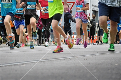 Runners in the Auckland Kids Marathon (selective focus and motion blur)