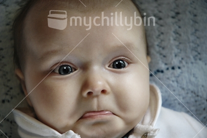 Unhappy baby about to start crying