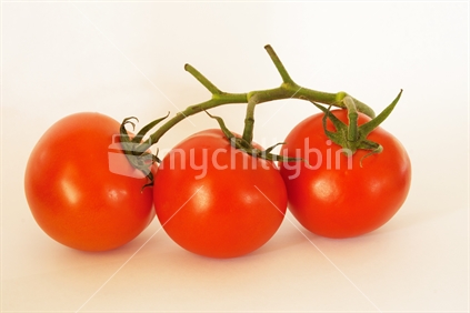 Three red tomatos.