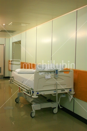 Hospital bed in corridor
