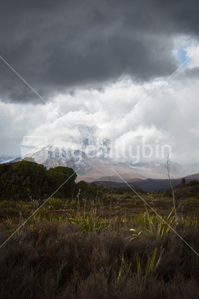 A storm approaches Mount Ngauruhoe on the volcanic plateau, North Island, New Zealand.