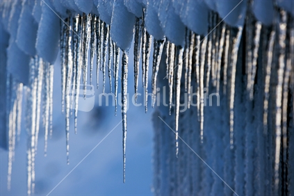 Icicles hanging from a hut