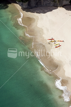 Aerial view of kayakers on a beach at Cathedral Cove, Coromandel