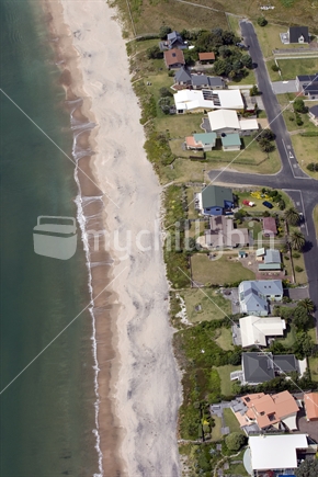 Aerial view of coastal houses & bachs, New Zealand
