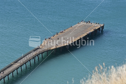 Aerial view of people fishing on Tolaga Bay wharf, New Zealand