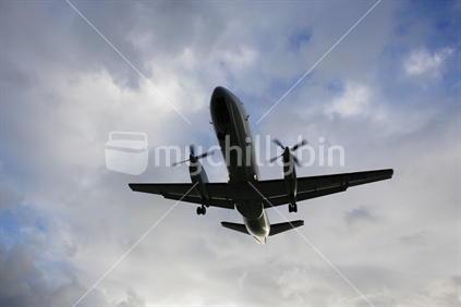 An aeroplane landing / taking off from airport.