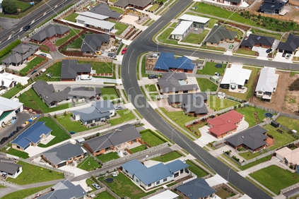 Aerial view of a modern suburban New Zealand neighbourhood.