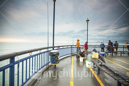 Fishing off new-brighton pier (raised ISO)