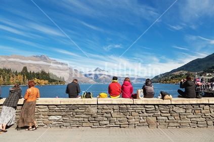 People admiring view of lake Wakatipu,Queenstown