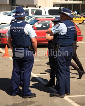 Police huddle