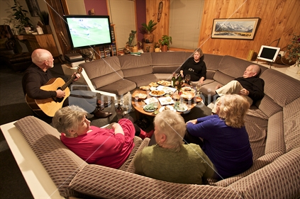 Friends relaxing in a New Zealand home.