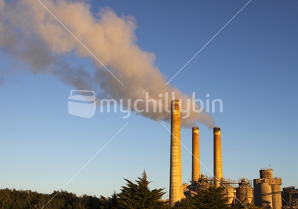 Carbon emissions. Pollution from the chimneys of industry