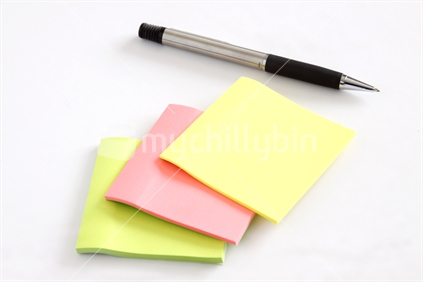 Sticky notepads and pen. Write your own text.