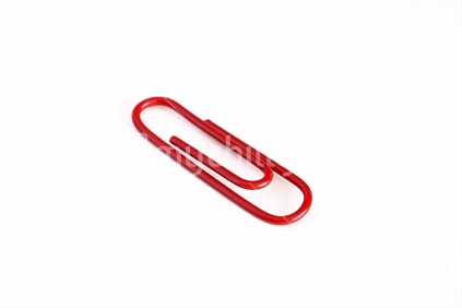 Single red paper clip.