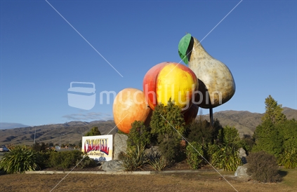 Cromwell town sign, and icon fruits.  New Zealand.