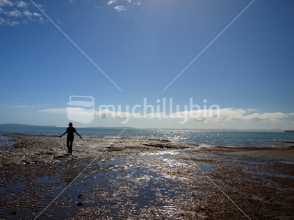 Beachcombing at low tide