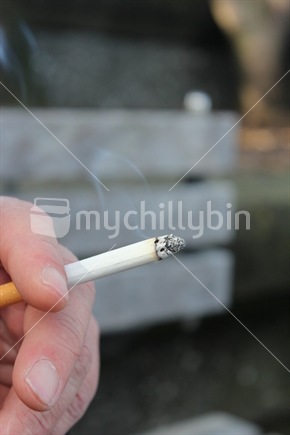 Smoking a cigarette