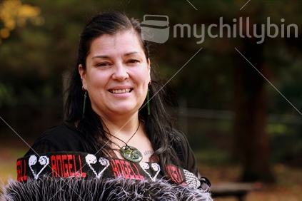 Contemporary Maori woman in korowai (cloak)