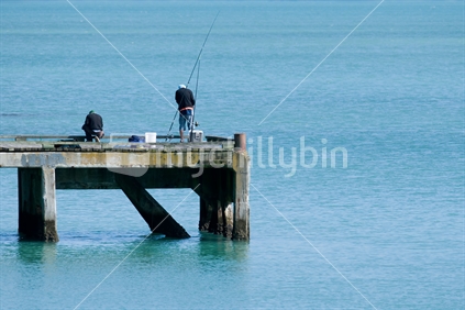 Two Men on a wharf Fishing