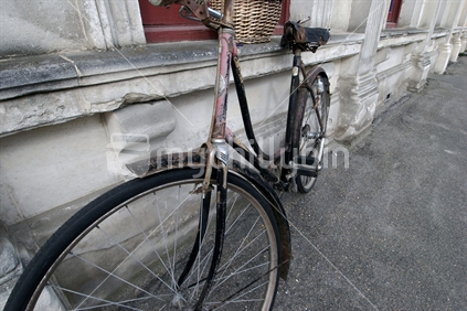 Old bike outside a shop in Oamaru, New Zealand