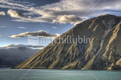 Ben Ohau dominates the Lake Ohau scene.  This photo was taken at dusk from past the Ohau River weir and siphon, New Zealand