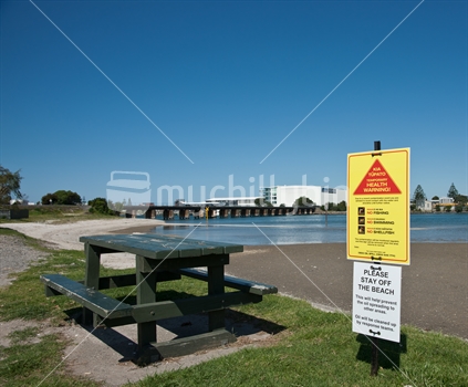 Warning signs have sprung up around Tauranga beaches in wake of the Rena shipping disaster. Signs warn of contamination that might occur on the beaches.