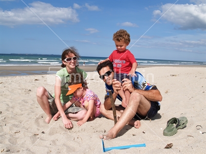 Mum, Dad and two children, a day at the beach.