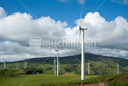 Wind turbines over rural landscape, Te Apiti, New Zealand.