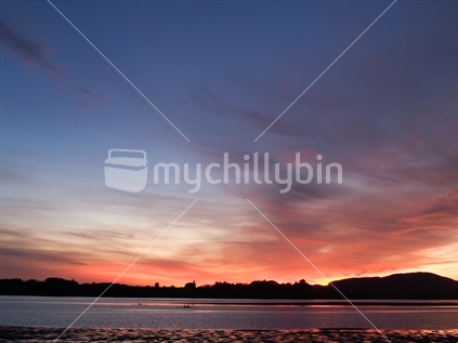 Tauranga harbour with the brilliant sky as sun rises
