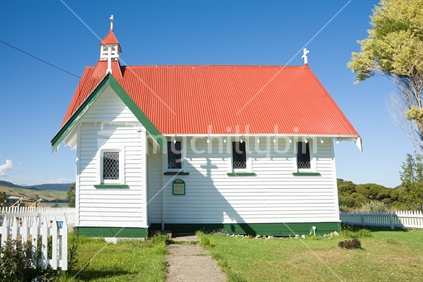 St Mary's Anglican Church, small quaint white country church with red roof in Waikawa, the Catlins, Otago.