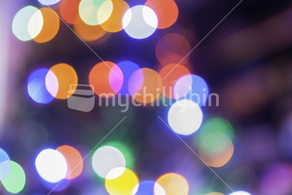 Christmas lights colorful bokeh defocused abstract pattern.