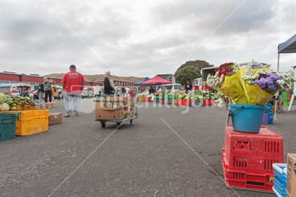 Lions Club of Titahi Bay Porirua Saturday Market early morning on Feburary 13 2016 stall holders are open for business and locals arriving and wandering buying food, fresh produce  and nick nacks