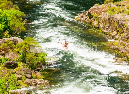 Fighting the rapids on Wairoa River kayaking Tauranga one of New Zealand's most popular rivers for kayaking and rafting
