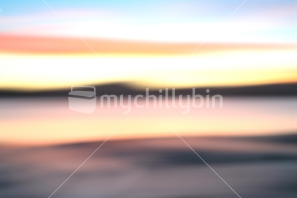 Beautiful sky colors, natural coastal landscape background in motion blur.
