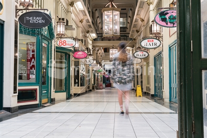 AUCKLAND, NEW ZEALAND - MARCH 25, 2018;  Blurred unrecognisable shape of person in The Strand Arcade of shops and boutiques in historic arcade built 1910, Queen Street, Auckland.