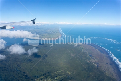 Aerial of New Zealand coastline flying home. (focus wing tip)