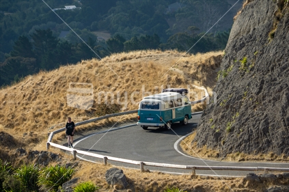 Hastings New Zealand - February 16 2020; Blue and white VW Kombi descends Te Mata Peak in Hawkes Bay, New Zealand, landscape view across surrounding hills and  Heretaunga Plains