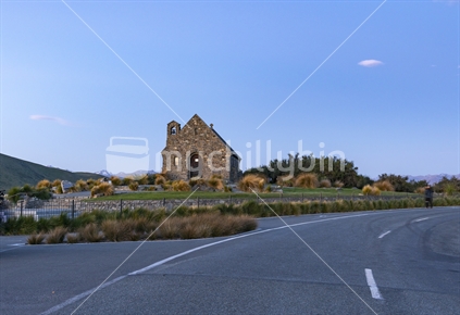 Historic Church of Good Shepherd famous tourist destination on shore of Lake Tekapo at twilight in New Zealand.
