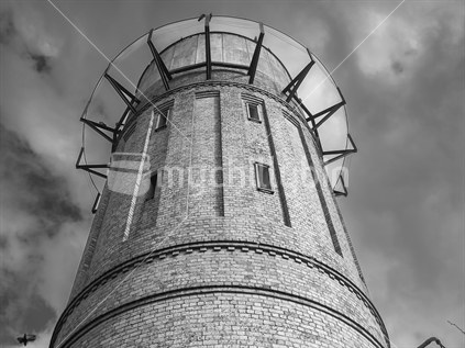Low point of view of historic landmark water tower in Cambridge NZ.