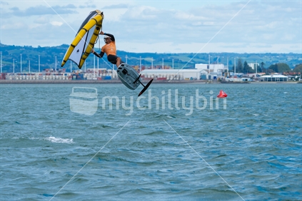 Tauranga New Zealand - March 8  2023; Wingfoiling action across Pilot Bay in GWA tour event