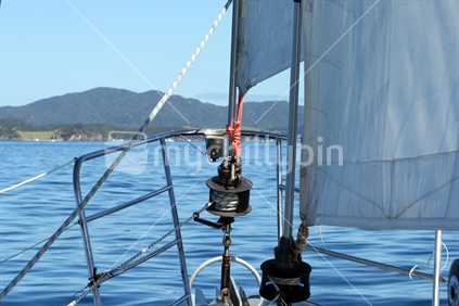 View from the bow of a yacht sailing in the Bay of Islands, New Zealand