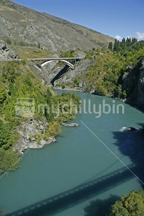 Shadows of the Historic Kawarau Bridge, with the newer bridge in the distance on the Cromwell to Queenstown highway , Central Otago.