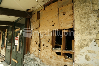 An historic building under demolition, Central Otago.