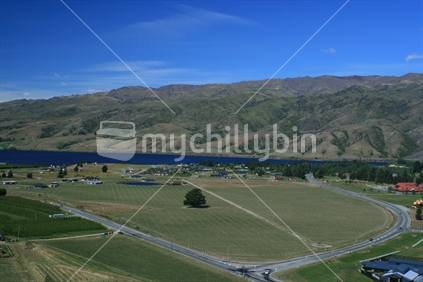 From a lookout above Cromwell, toward Lake Dunstan there are stunning views over the valley, incorporating many different wineries and orchards. New Zealand