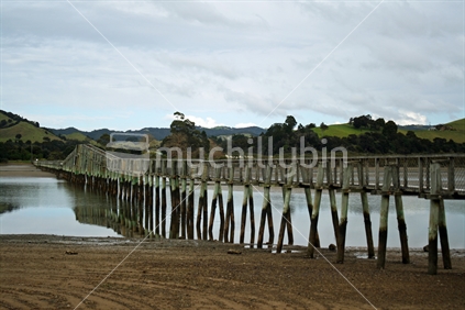 Whananaki Bridge at low tide, Northland, New Zealand.