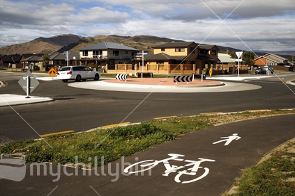 Signage indicating a sharec cycle and pedestrian bypass off  the roundabout, Cromwell Central Otago.