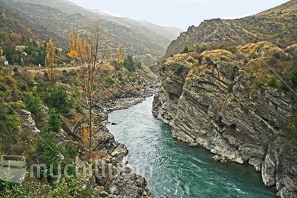 Steep rocky faces on either side of Kawarau River, Central Otago.