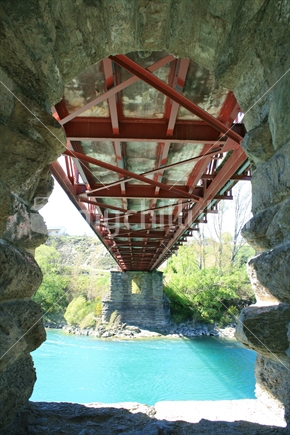 The support structure of Clyde Bridge is built of local schist stone.  Spanning the Clutha river traffic is connected with the township and Earnscleugh Road an alternate route to Alexandra, Central Otago, NZ