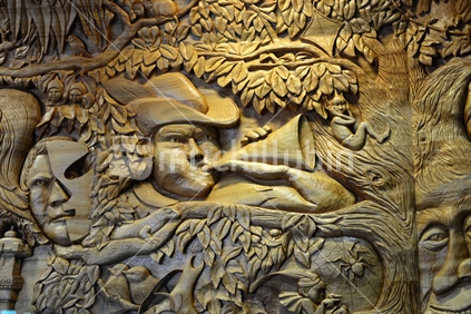 Part of a an ornately carved wooden panel on public display at Hamilton Gardens.  Derek Kerwood and Megan Godfrey 1998. 
